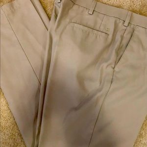 38/32 Haggar dress pants. Tan light weight material.